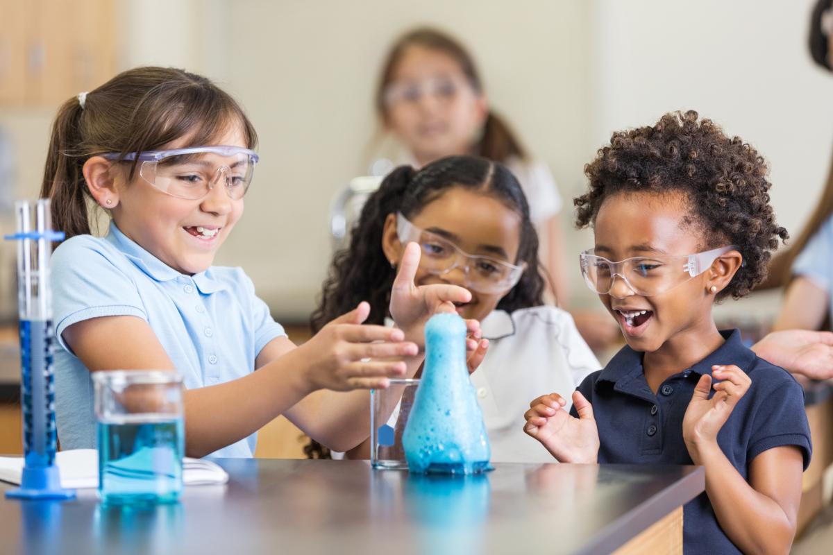 Children engaged in science experiments 
