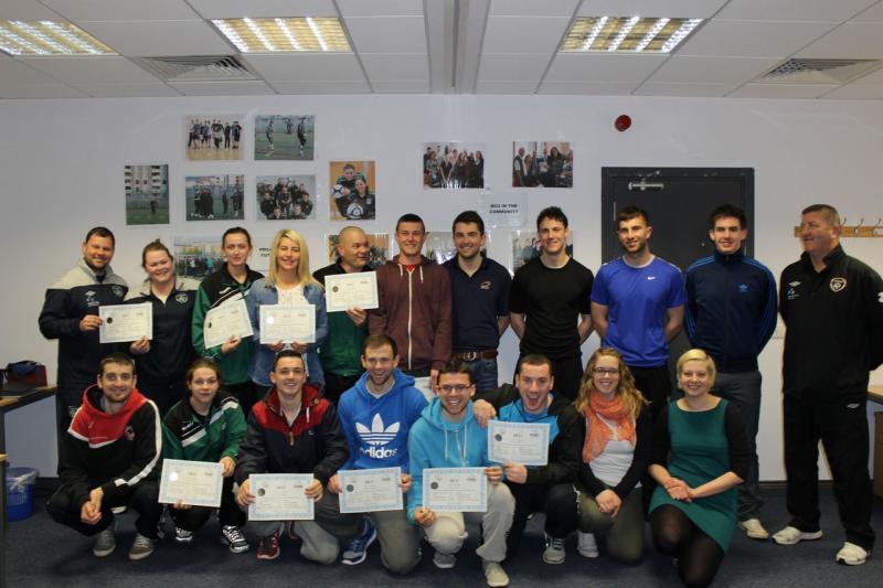 FUTSAL Coaches with their final certificates along with DCU Students, FAI Coaches and Joanna Ozarowska (front right) from DCU in the Community