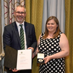 Dr. Eilish McLoughlin receiving her award from Dr. Eilish McLoughlin receiving her award from Professor Paul Hardaker