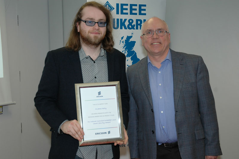 James Riley (left) receiving the 2013 Ericsson DCU Student Project Prize from Ultan O'Gorman