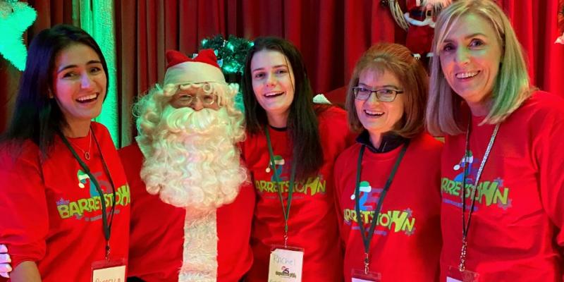 DCU volunteers meet Santa at Barretstown's Winter Wonderland