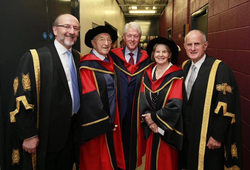 Group photo of President Brian MacCraith, Dr. Martin Naughton, President Bill Clinton and Sr Stanislaus Kennedy