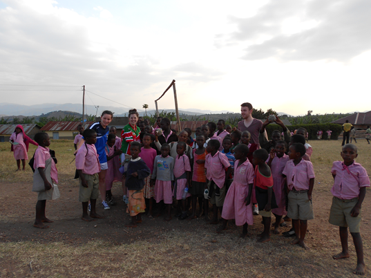 Children of a local national school and Réalt participants near Rukungiri PTC, Rukungiri, Uganda (2013)