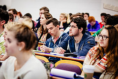 Photo of students in a lecture hall.