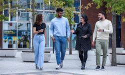 Students speaking to an employer