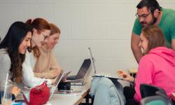 TY students doing maths with help from lecturer