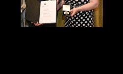 Dr. Eilish McLoughlin receiving the 2018 Lise Meitner Medal and Prize