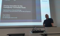 The picture illustrates Mr. Kelleher talking to the DCU engineering students