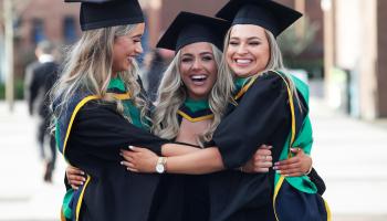 Image of DCU graduates hugging