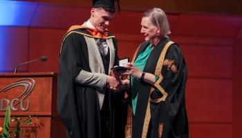 Shows Jordan Morrissey receiving his Chancellor's Medal from DCU Chancellor Brid Horan