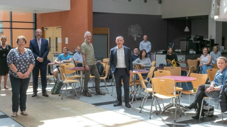 Volunteers from the School of Biotechnology and DCU with HSE Chief Executive Officer Paul Reid