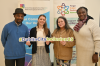 four participants holding up a sign saying Dublin City Inclusion 2025 at the PPN Summer School Graduation