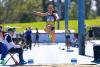 DCU athlete competing in the women's triple jump