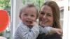 Shows mum and toddler at Bake off for Barretstown event