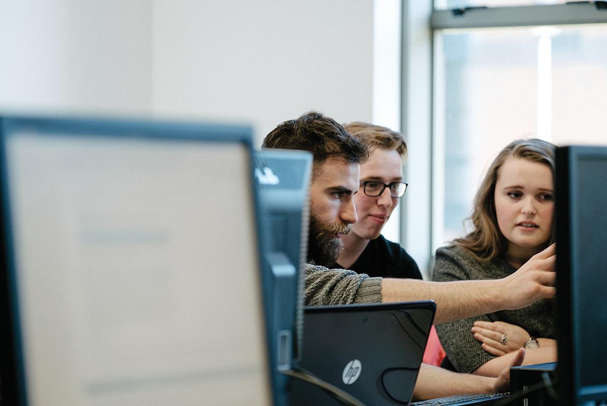 3 students working at a computer