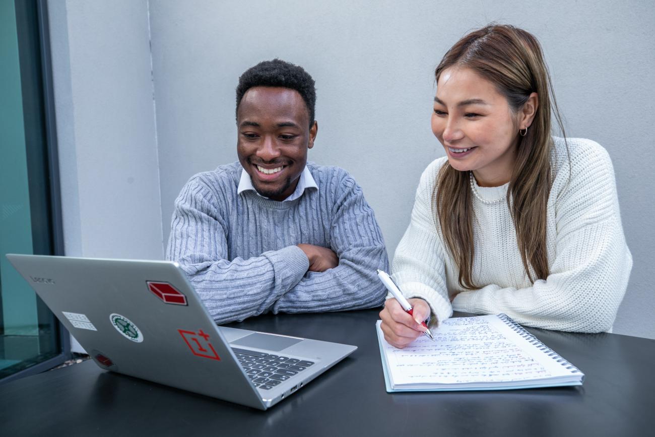 Students studying on laptop