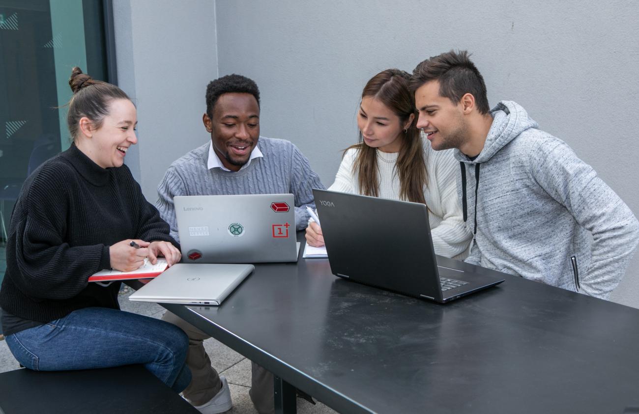 Students working on laptop
