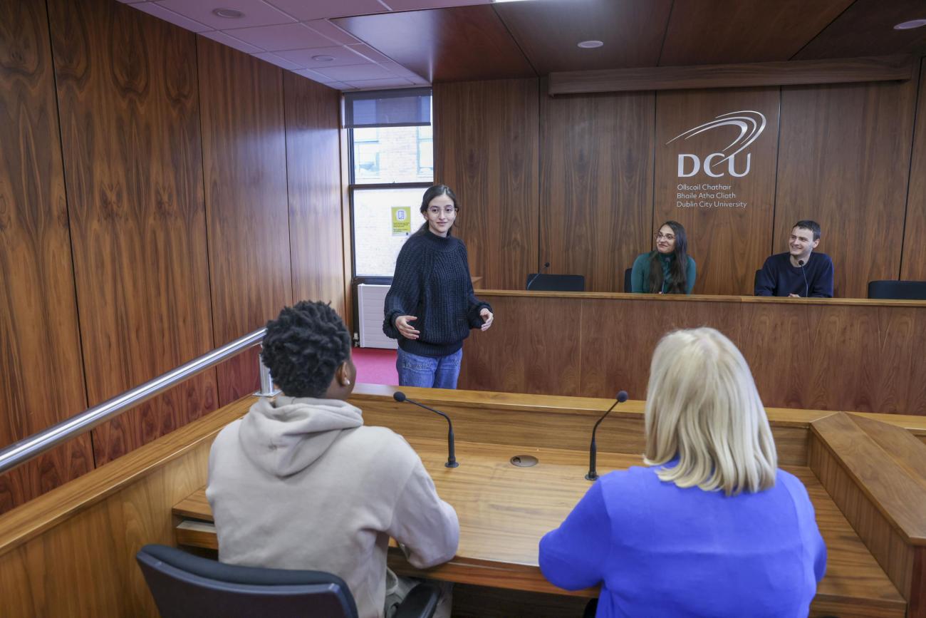 Students sitting in mock court room setting