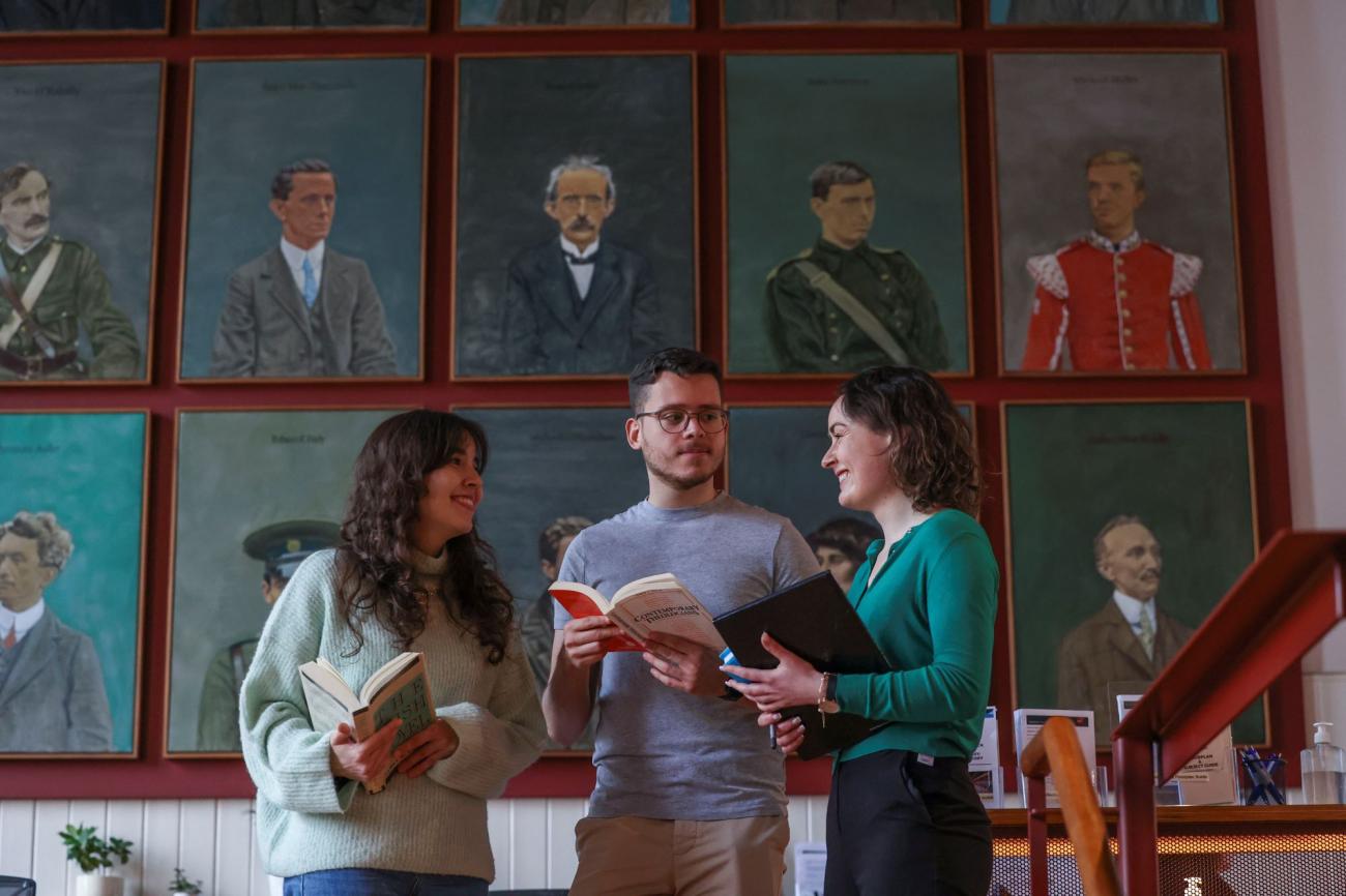 Students talking outside the library