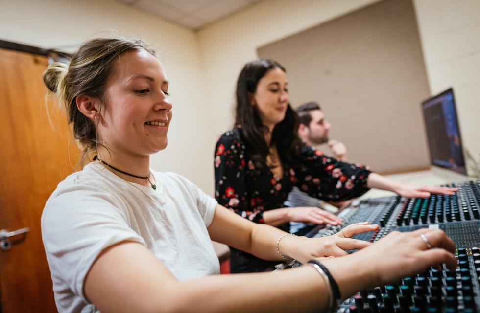 This image shows students working in the radio area