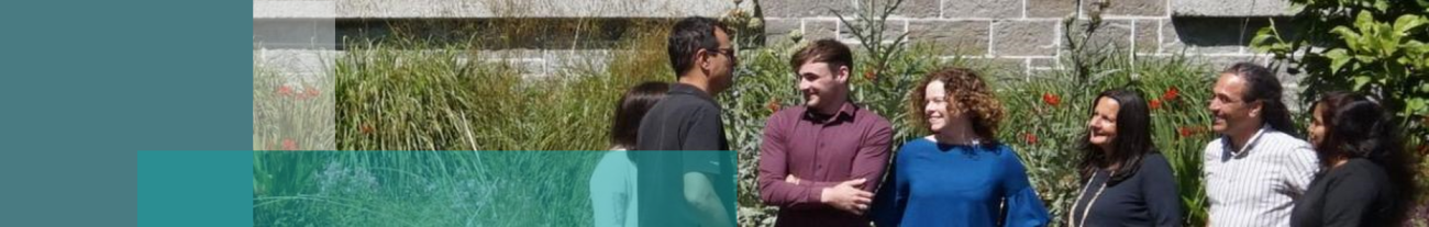 People chatting outside building