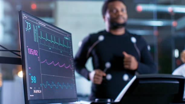 Athlete on treadmill with monitor