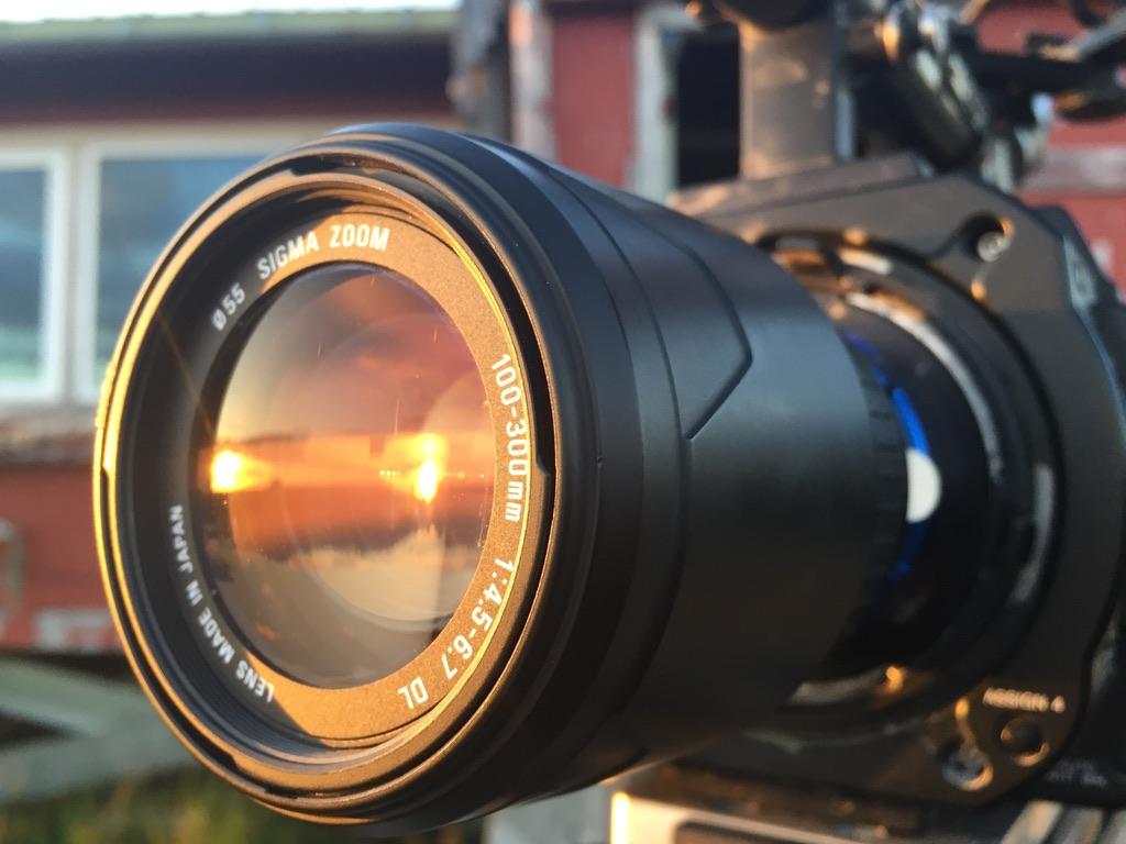 Shows a camera lens