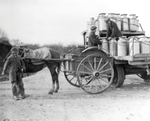 Shows three men and a horse and cart with metal canisters on it
