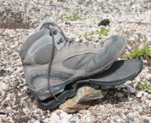 Shows a boot with a broken sole