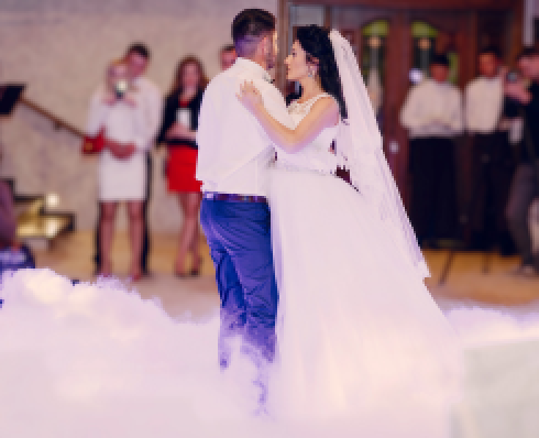 Shows a picture of a couple dancing at their wedding