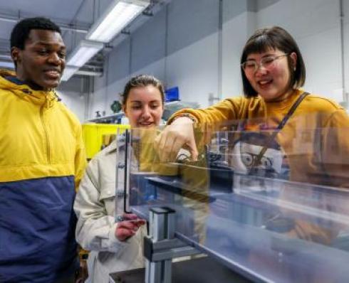 Image shows students working in the lab