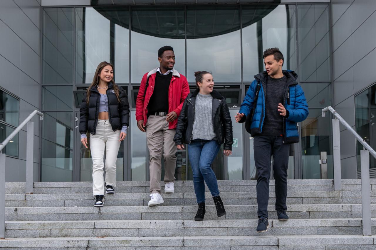 Students walking down steps