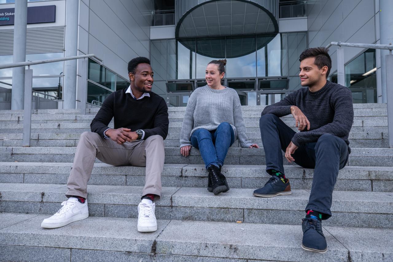 Students sitting on steps