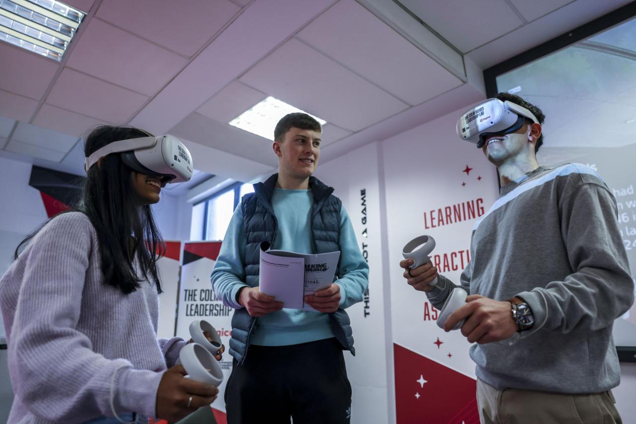 Students wearing virtual reality headsets