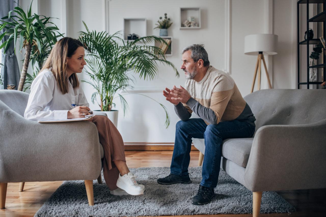 MSc in Psychotherapy - man talking to woman
