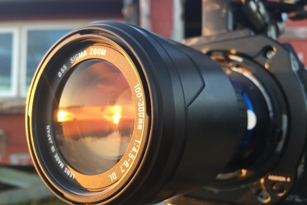Shows a camera lens