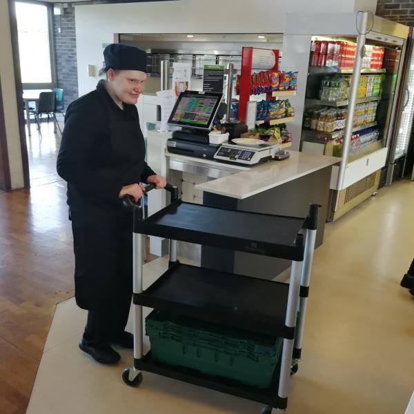 learner pushing a trolley at DCU Glasnevin Restaurant on their work placement