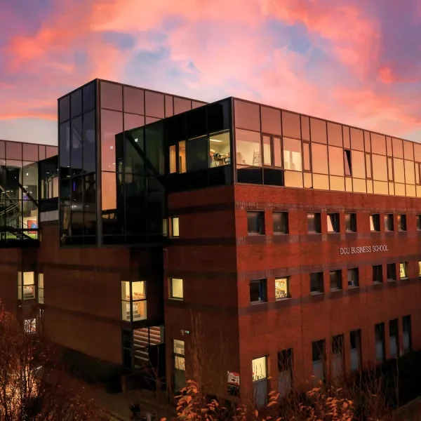 Shows DCU Business School at night