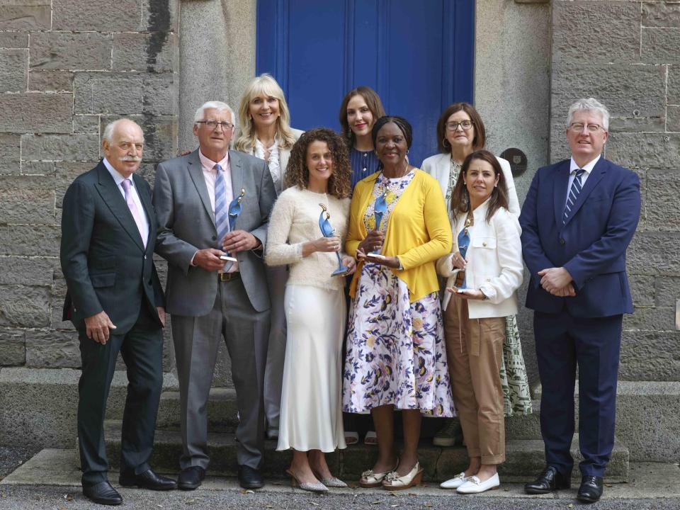 Group photo of award winners and presenters