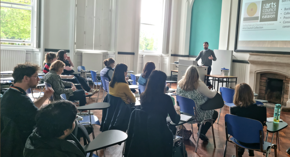 DCU staff group listen to Ben Mulligan discuss the arts council collection