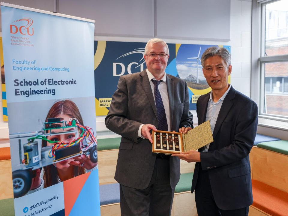 Dr Noel Murphy, Head of the School of Electronic Engineering, DCU (left) with Prof. Deshi Li, Head of the School of Electronic Information, WHU (right)