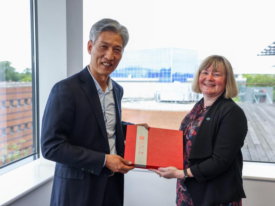 Prof. Deshi Li, Head of the School of Electronic Information, WHU (left) with Jennifer Bruton, Executive Dean, Faculty of Engineering and Computing, DCU (right)