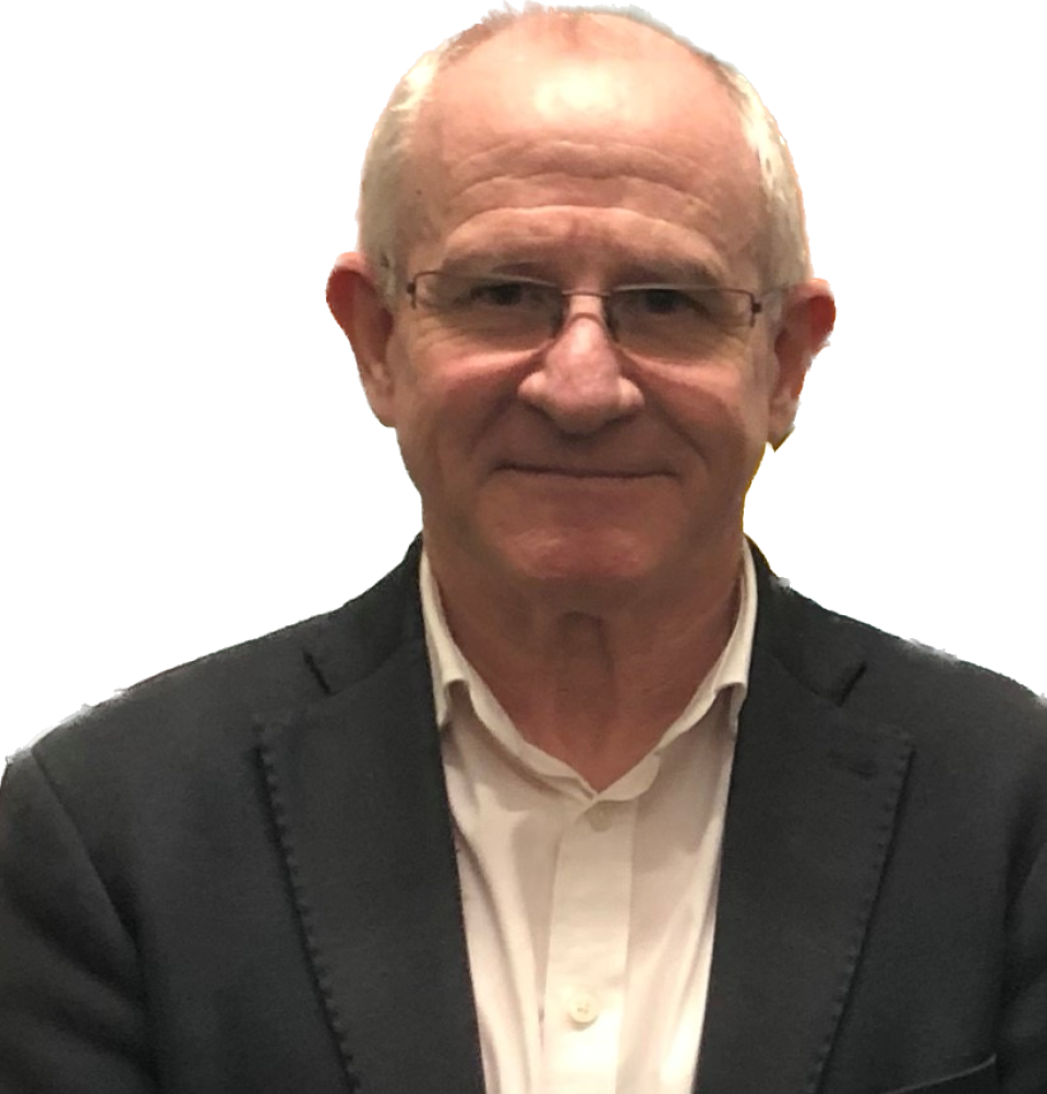 Caucasian male with grey hair wearing white shirt and dark coloured jacket, smiling face on to camera