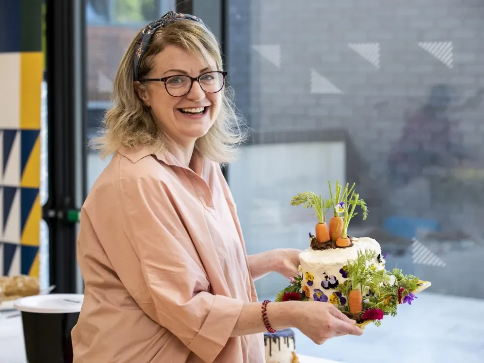 Marcella Bannon holds her bake off cake