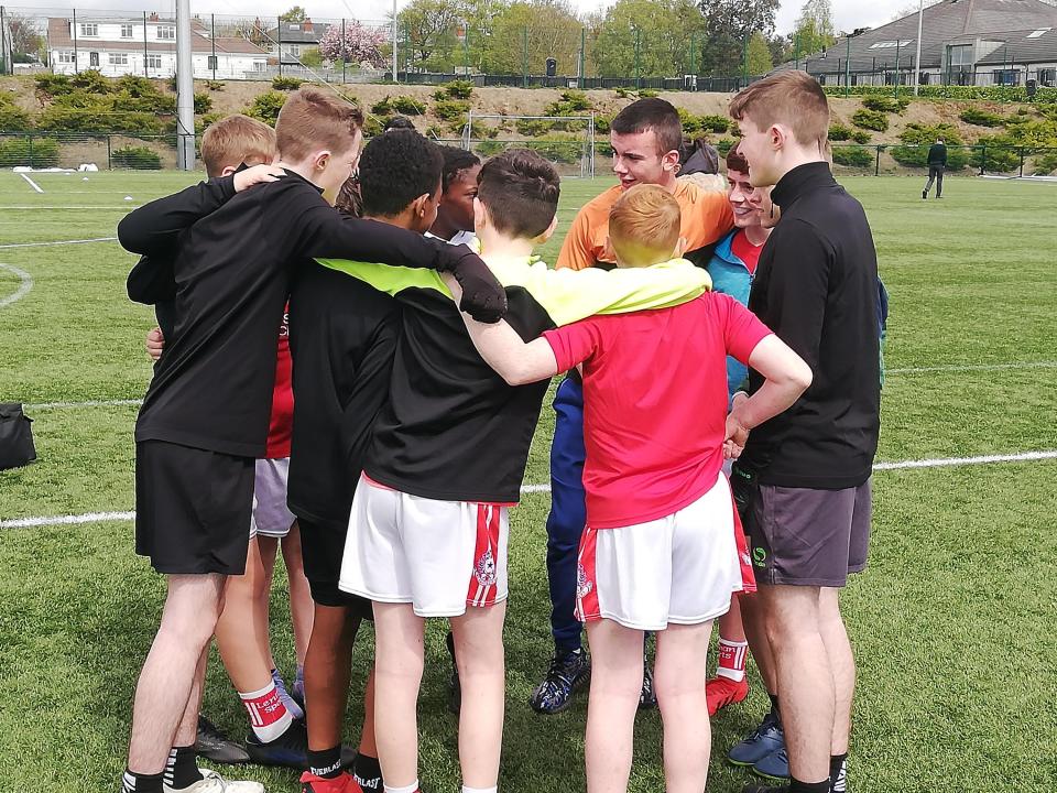 A group of students playing sport