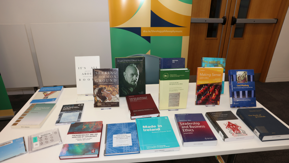 Shows a display of books published by the School of Theology, Philosophy and Music