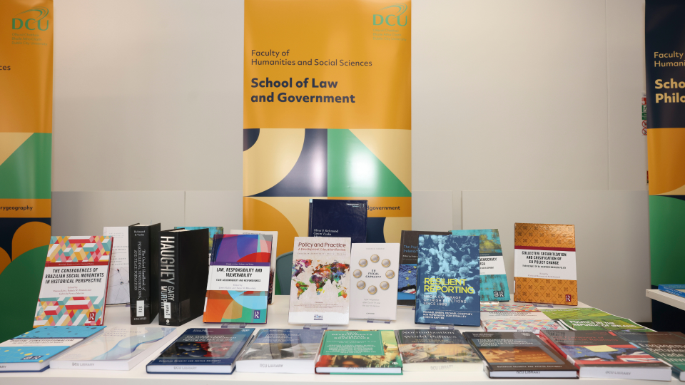 Shows a display of books published by the School of Law and Government in DCU