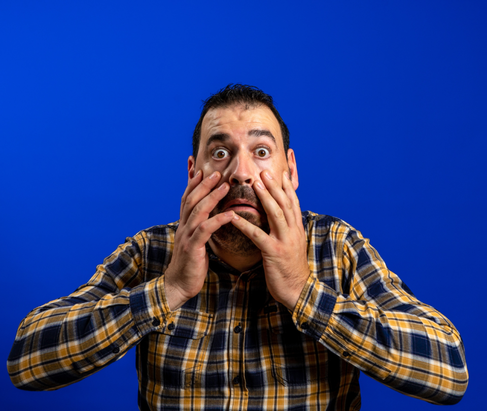 Shows a picture of a man looking shocked