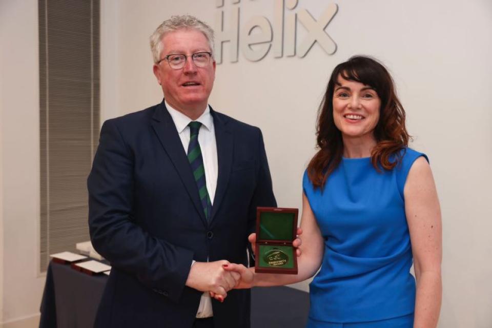 Prof. Maura McAdam receives DCU President's Award for Research from DCU President Daire Keogh