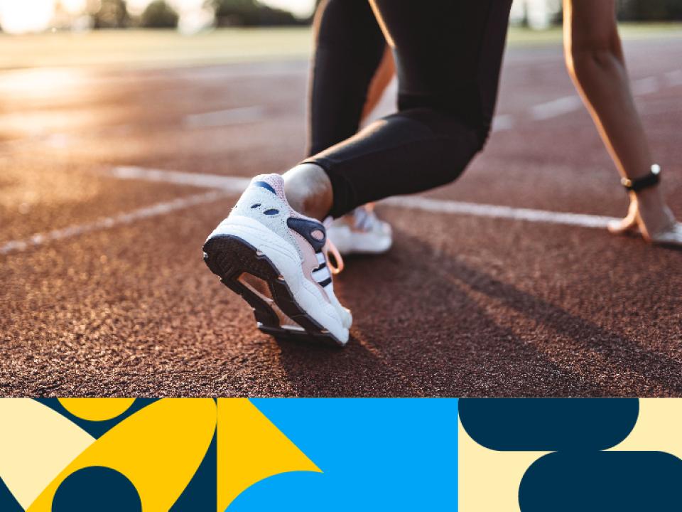 Shows close up shot of athlete on running track